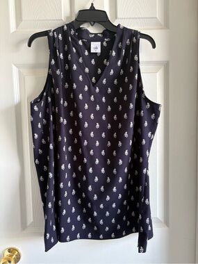 CAbi navy sleeveless V-neck camisole with white floral motif